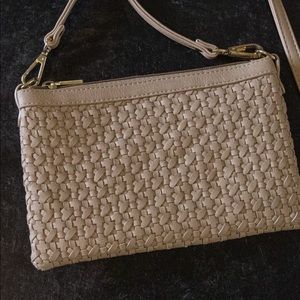 Tan cross body bag